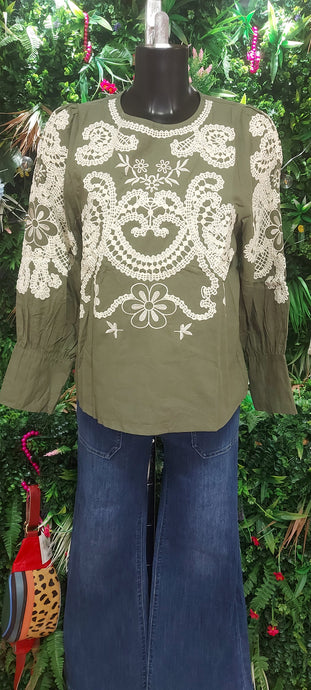 A kiki green embroidered top