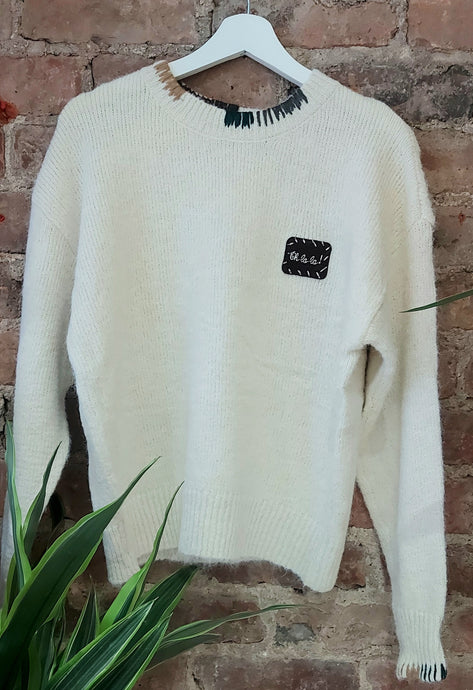 Ellie oh la la knot cream stitch sweater